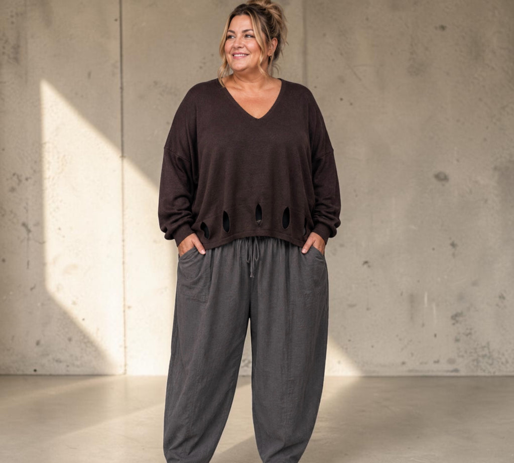 Moonshine trui met gaten onderkant One size past voor meerder maten