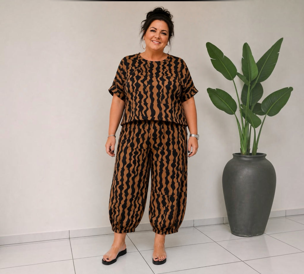 Naveed iets ruimvallende enkel broek One Size past tot maat 54 🔴