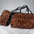 Animal print tas met extra tasje binnenkant fake bont