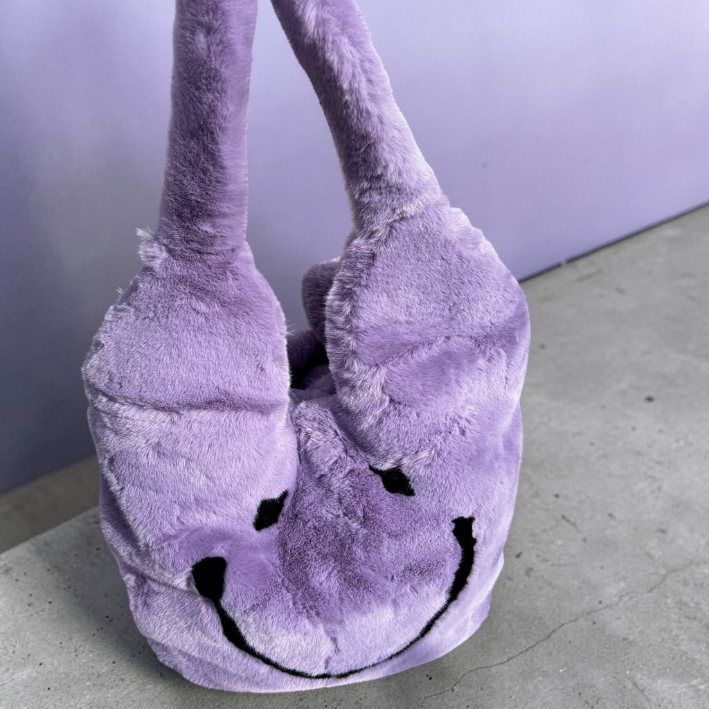 Grote fake bont tas met smiley in paars