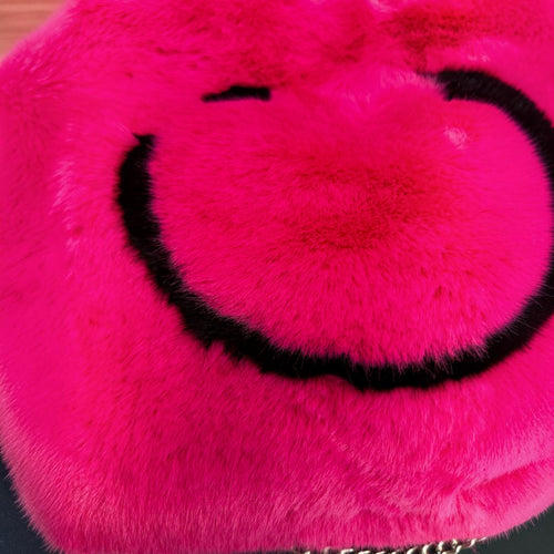 Fake bont tasje met lang hengsel in fel roze