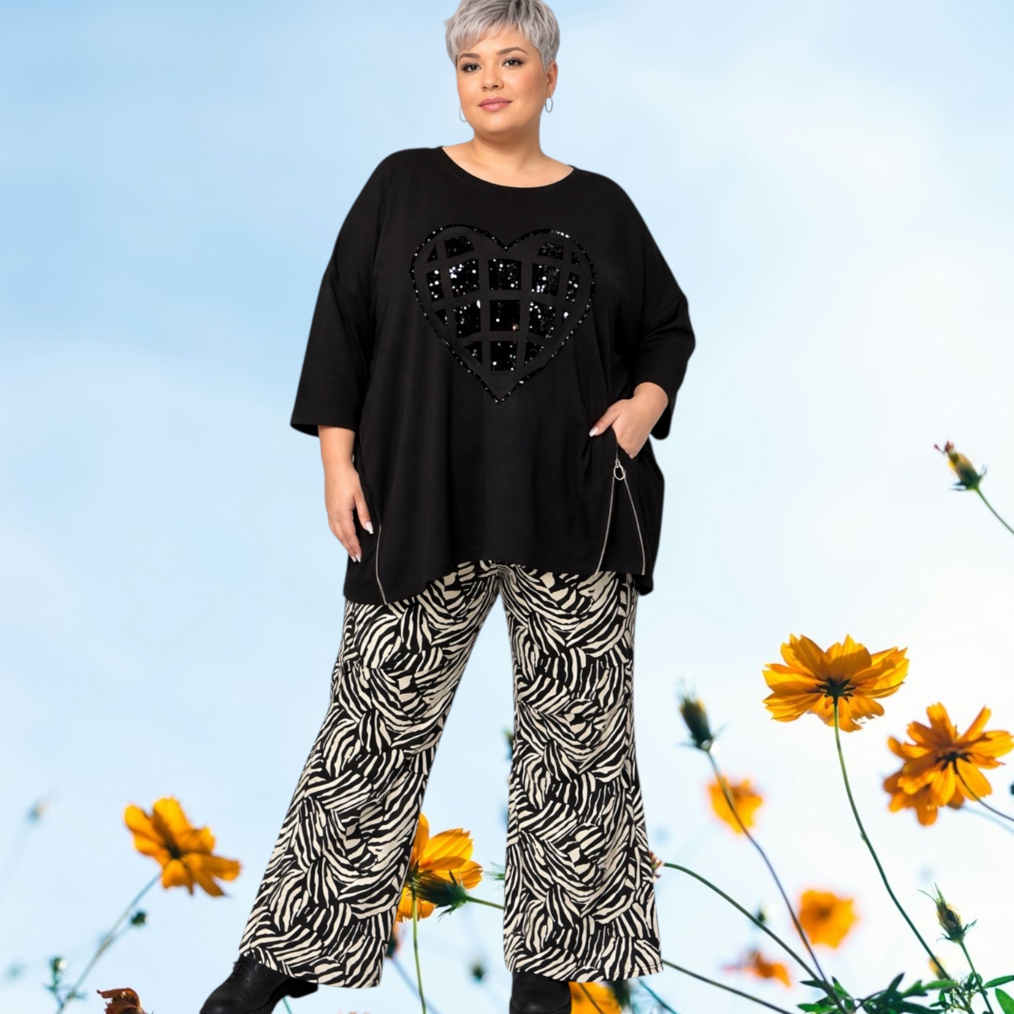 Maelle flair broek zwart/wit mt 52/54 en 56/58